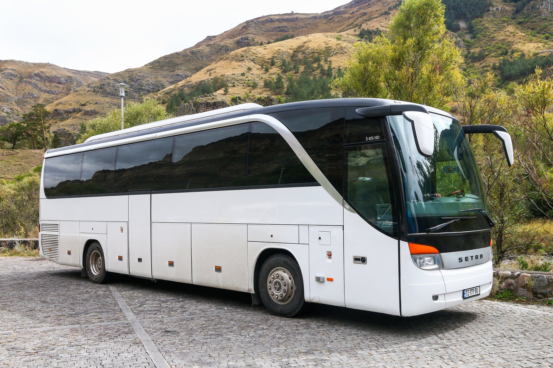 White touristic coach bus
